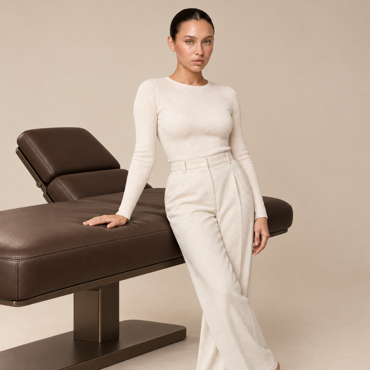 BOO editorial portrait in ivory beside a chocolate treatment chair